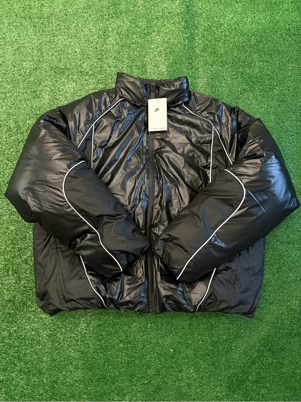 Nike Black Puffer Jacket with White Reflective Piping